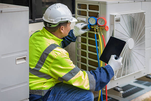 Professional Heat Pump Repair technician working in Somerset, TX